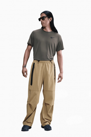 Штани Nike Tech - коричневий