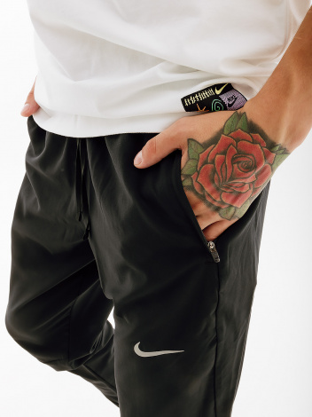 Спортивні штани для бігу Nike M NK ESSENTIAL WOVEN PANT чорні BV4833-010
