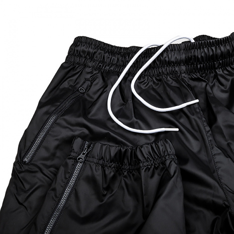 Спортивные штаны Nike WINDRUNNER WOVEN LINED PANTS черные DX0653-011