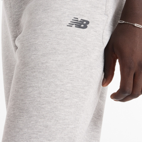 Спортивні штани New Balance SPORT FLEECE світло-сірі MP43904AG