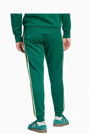 Штаны adidas Adicolor Classics SST Track - зеленый