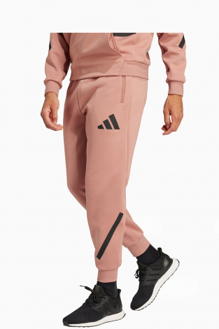 Штани adidas Z.N.E. - рожевий