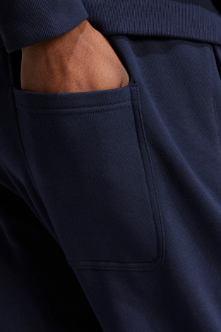 Штани adidas All SZN Fleece Regular Tapered - темно-синій