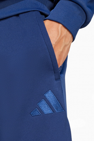 Штани adidas Tiro 25 Travel - темно-синій