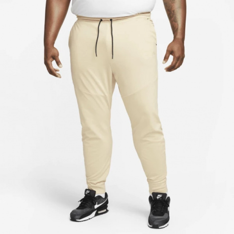 Спортивные штаны Nike M NK TECH LGHTWHT JGGR бежевые DX0826-783