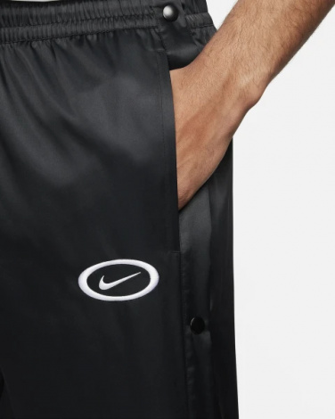 Спортивные штаны Nike M NK DNA WVN PANT TA RPL SSNL черные FN2726-010