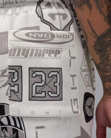 Спортивні штани Nike JORDAN ESSENTIALS PRINTED FLEECE білі HM7257-133