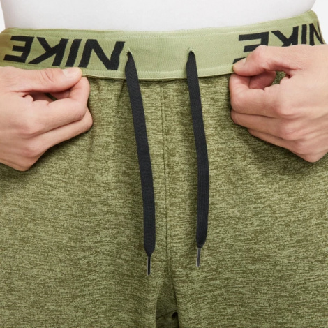 Спортивні штани Nike M NK TF PANT TAPER зелені DQ5405-326