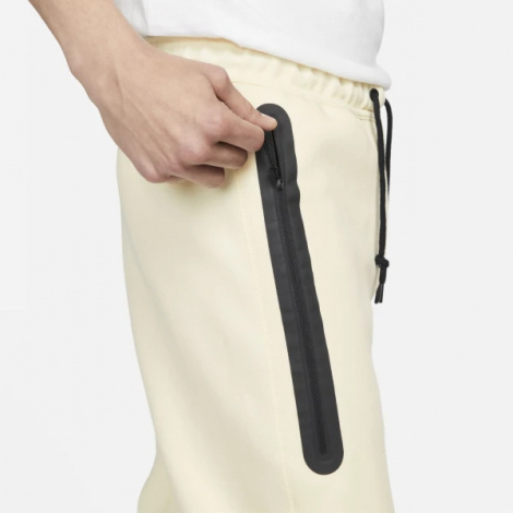 Спортивні штани Nike M NK TCH FLC JGGR молочні FB8002-113