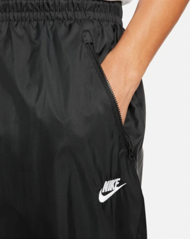 Спортивные штаны Nike WINDRUNNER WOVEN LINED PANTS черные DX0653-011