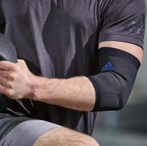 Фіксатор ліктя Adidas PERFORMANCE ELBOW SUPPORT чорно-синій M ADSU-13332BL