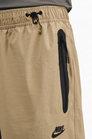 Штани Nike Tech - коричневий