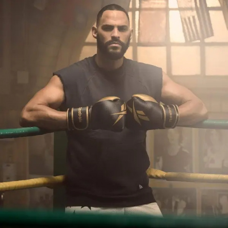 Перчатки боксерские Reebok BOXING GLOVES черно-золотые (12 унций) RSCB-11117GB-12