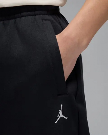 Спортивные штаны Nike JORDAN BROOKLYN FLEECE OVERSIZED OPEN-HEM черные IB7238-010