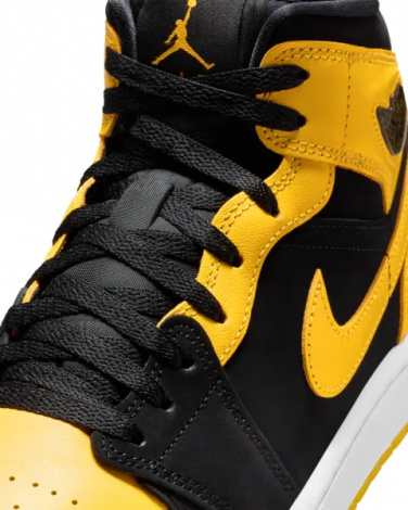 Кросівки Nike AIR JORDAN 1 MID SE жовто-чорні HJ6654-071