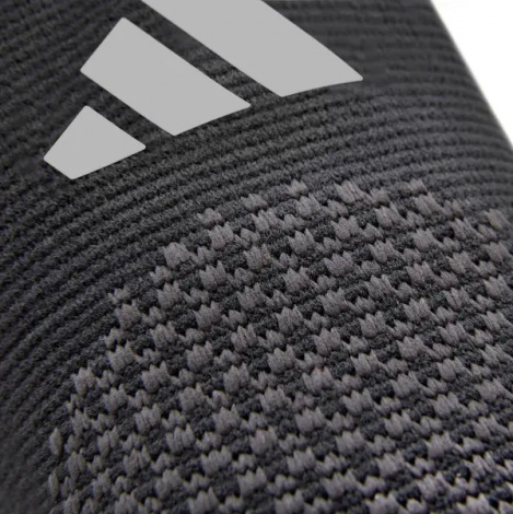 Фіксатор ліктя Adidas PERFORMANCE ELBOW SUPPORT чорний L ADSU-13333-NL