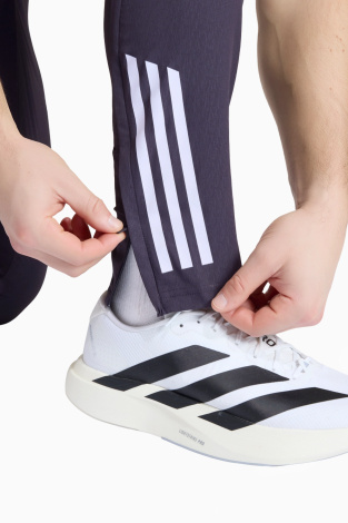 Штани adidas Manchester United 25/26 Presentation - фіолетовий