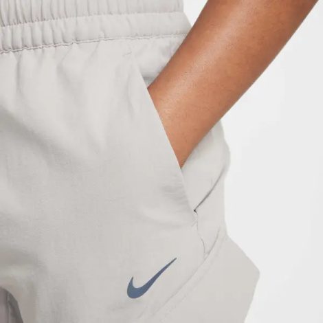 Спортивні штани підліткові Nike SPORTSWEAR CITY UTILITY CARGO світло-сірі FZ4904-009