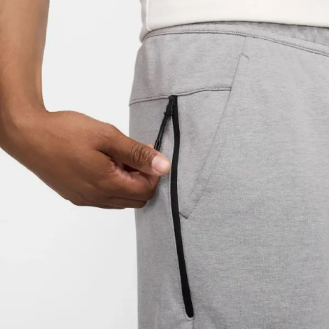 Спортивные штаны Nike SPORTSWEAR TECH ESSENTIALS серые DD5293-002